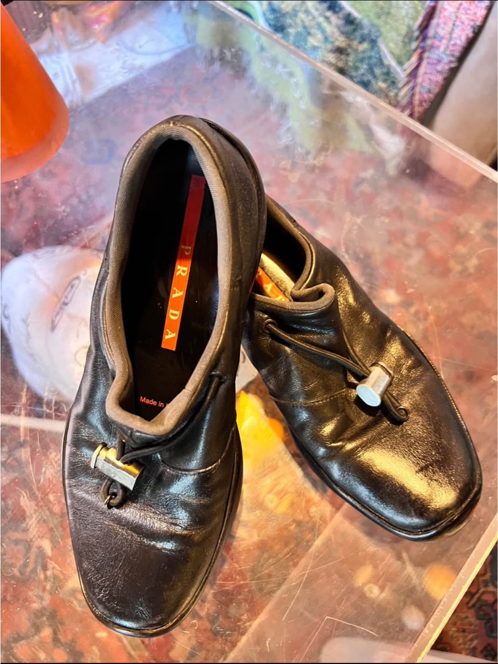Prada Black Leather Men’s Slip-On Loafers with Toggle